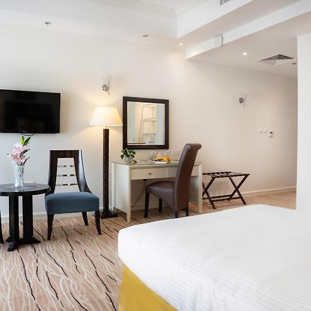 Plaza Inn Doha Quarto foto