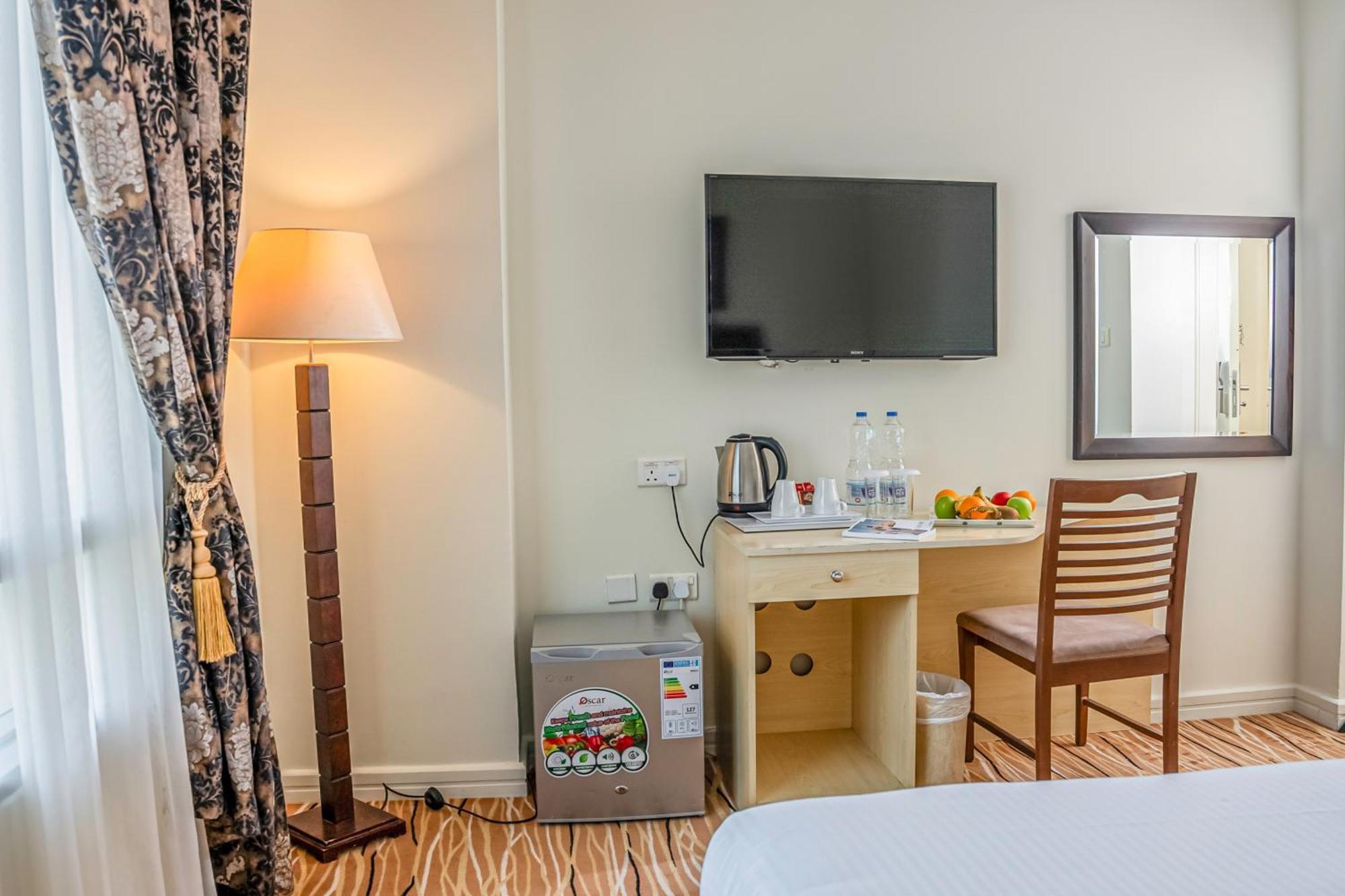 Plaza Inn Doha Quarto foto